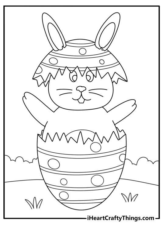 Rabbit themed printable sheet depicting rabbit popping out of a big spotted Easter egg