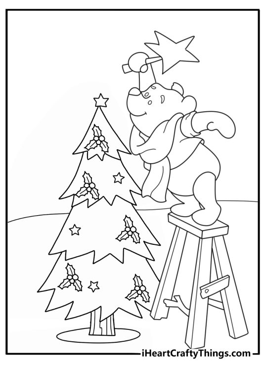 Winnie the Pooh Christmas coloring page with Pooh placing star on small fir tree