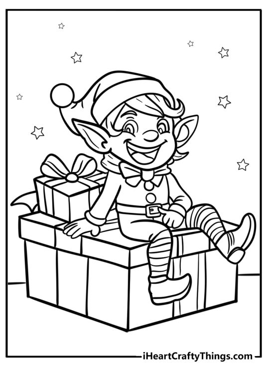 Christmas Elves-themed card featuring cheerful elf sitting on a big Christmas present