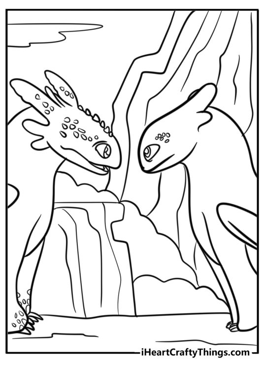 Coloring page featuring Toothless and Light Fury looking at each other with caves in the background