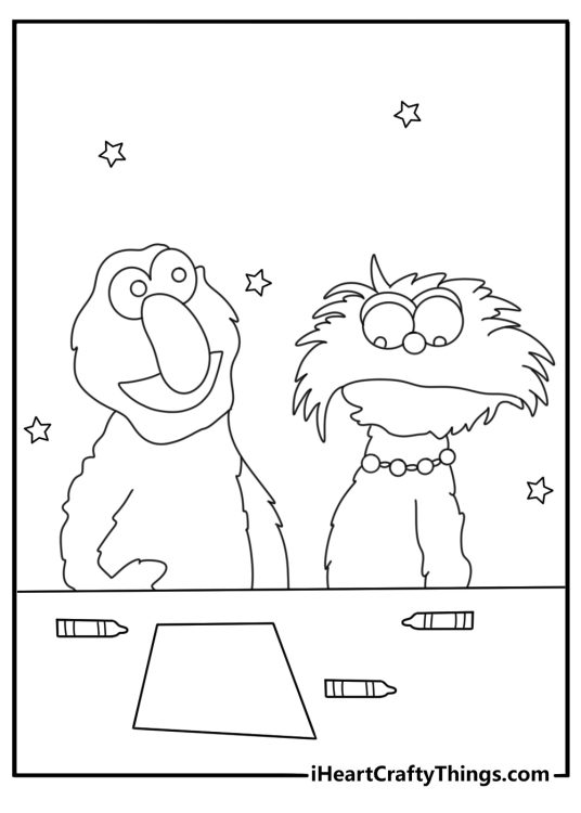 A classroom table with crayons surrounds Elmo and Zoe in this printable coloring sheet
