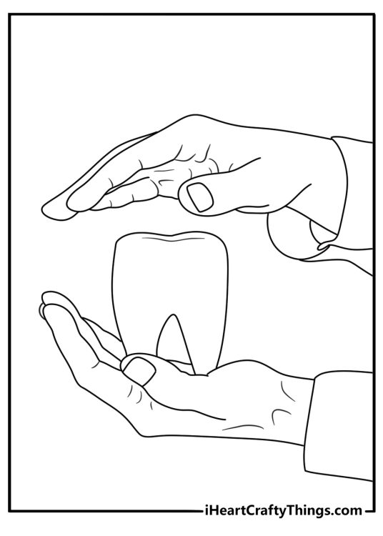 A dentist holds a large tooth model in this educational printable