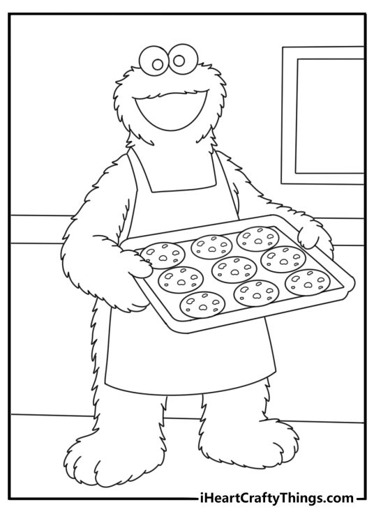 Cookie Monster bakes a tray of cookies in this fun coloring sheet