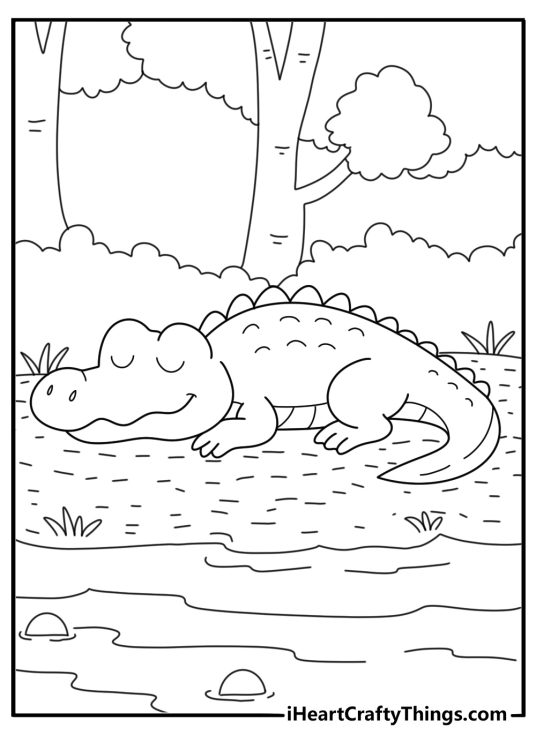 Crocodile resting on a muddy bank jungle printable coloring page