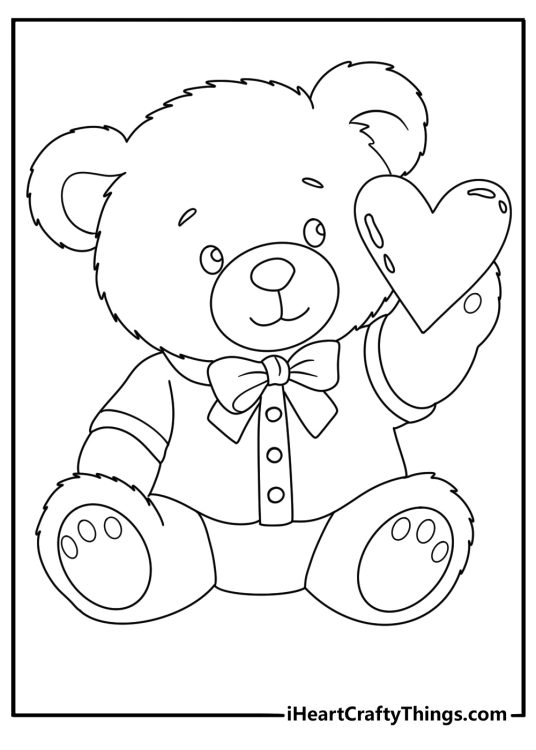 Free Teddy Bear printable featuring cute Teddy Bear with a big heart in his right hand