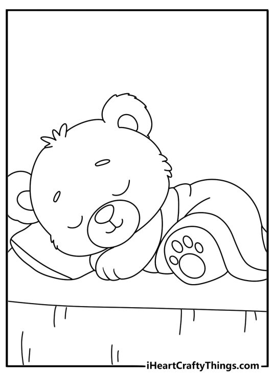 Free teddy bear printable of a teddy bear tucked under a blanket