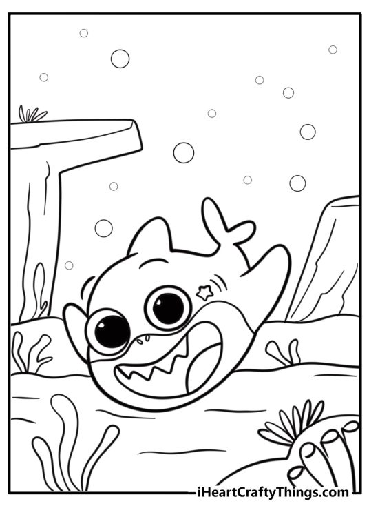 Baby shark under a coral reef coloring sheet