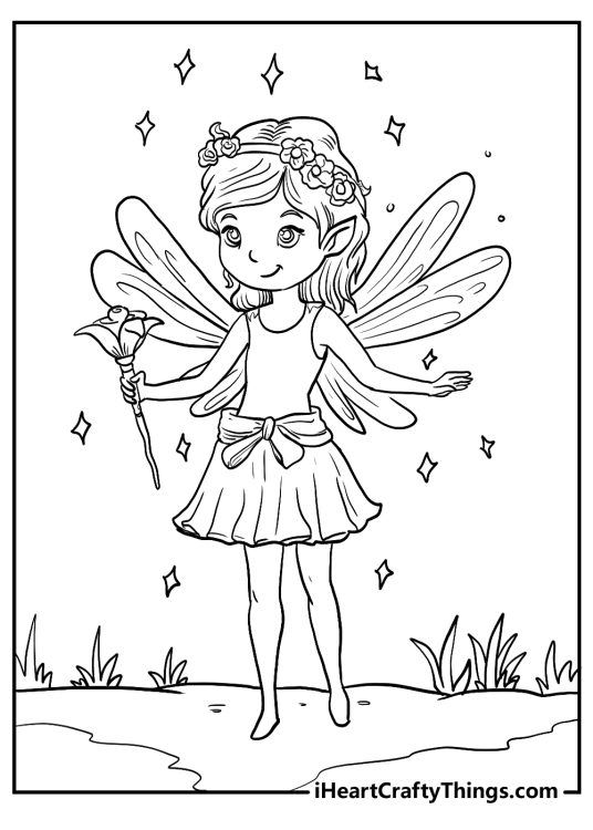 Free pdf depicting fairy with flowery wreath and her magical wand in a hand posing outdoors surrounded by sparkles