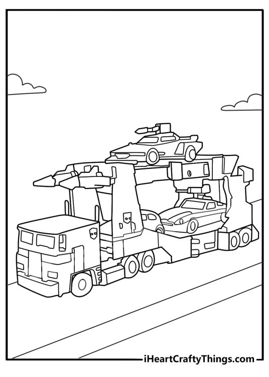ultra magnus in his truck mode pulling a stack of cars