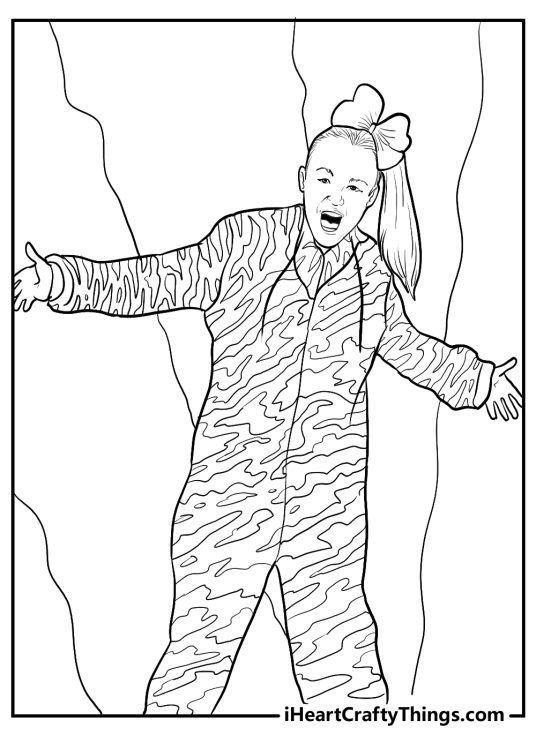Jojo Siwa in a intricate patterned jumpsuit with hands opened widely while singing printable page to color
