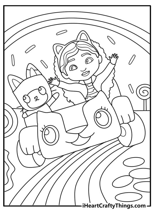 Carlita driving along candy road inside sweet themed dollhouse room