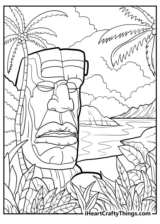 Hawaii-themed picture of a peaceful beach location and a traditional Hawaiian sculpture in the foreground
