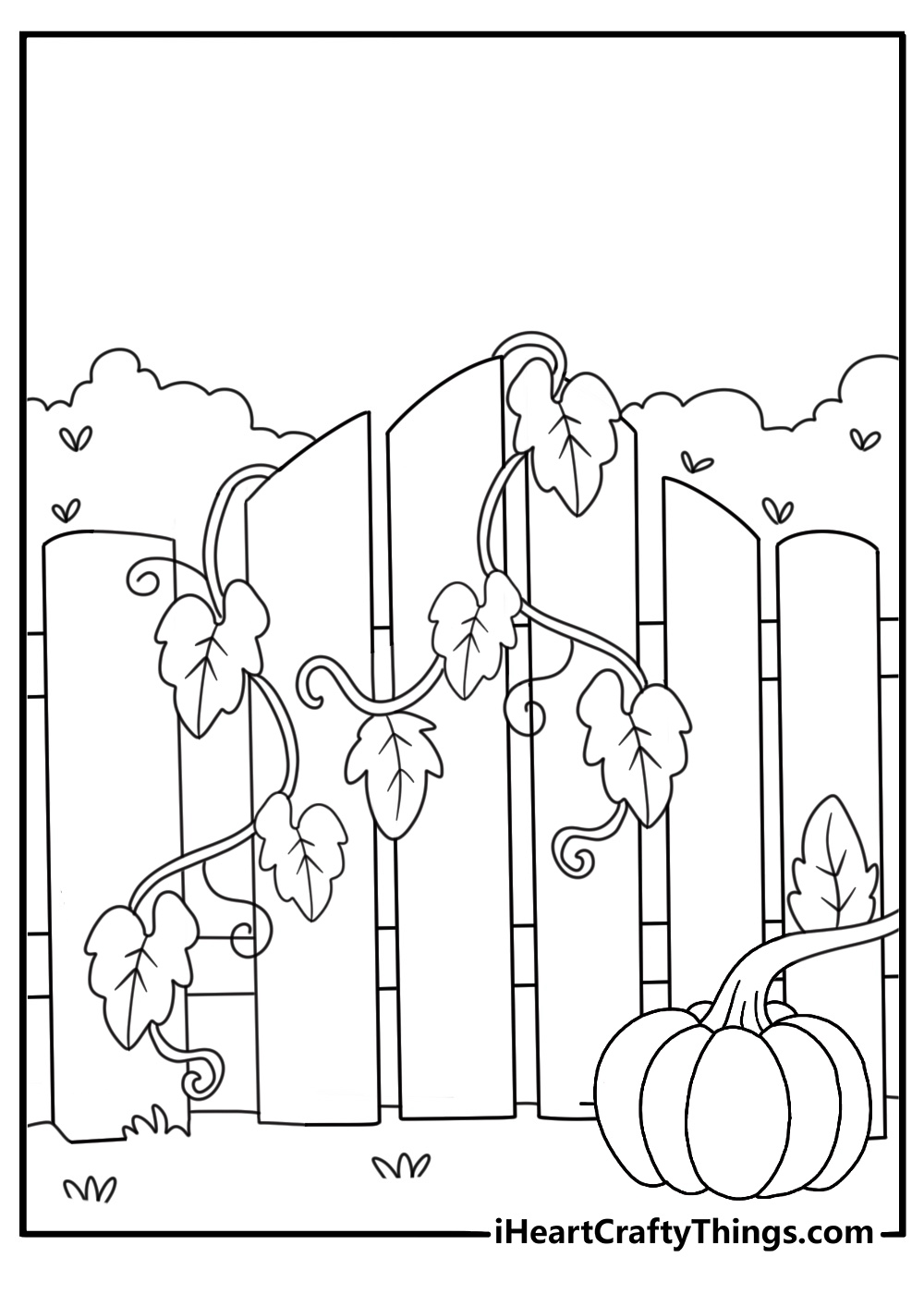 A pumpkin rests near a country gate covered with climbing ivy