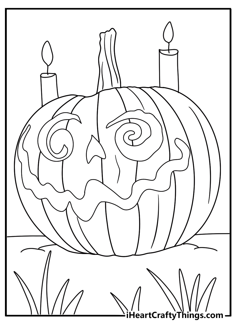 Printable poster featuring carved pumpkin standing on some grass framed by two lit candles
