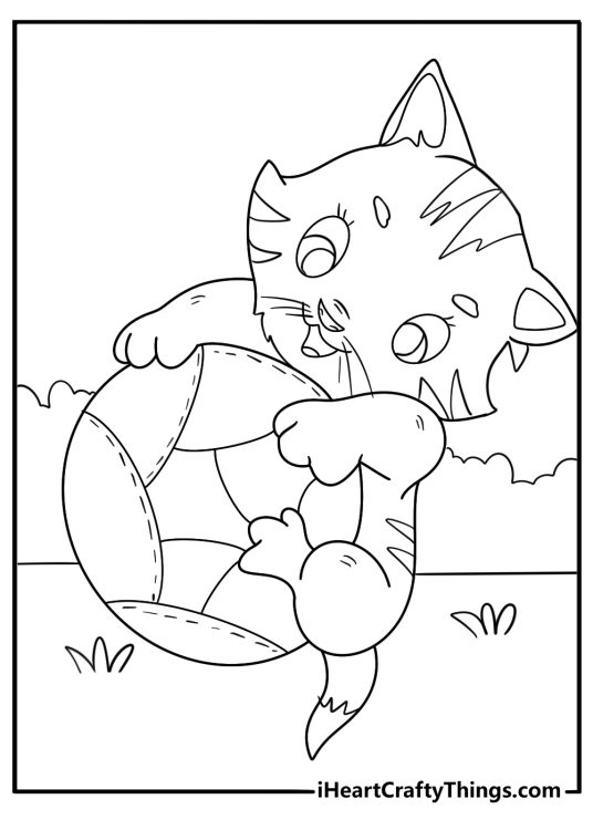 Cat themed printable of an adorable happy kitten sitting with a ball in each paw