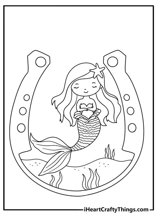 Free printable mermaid coloring sheet with a mermaid near a seahorse stable
