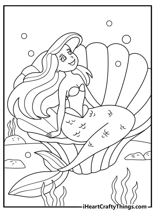 Mermaid coloring page for kids with a mermaid sitting in a clam shell