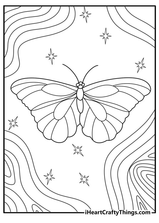 Picture of a butterfly with wings tinged with black around the ends surrounded by swirls and sparkles