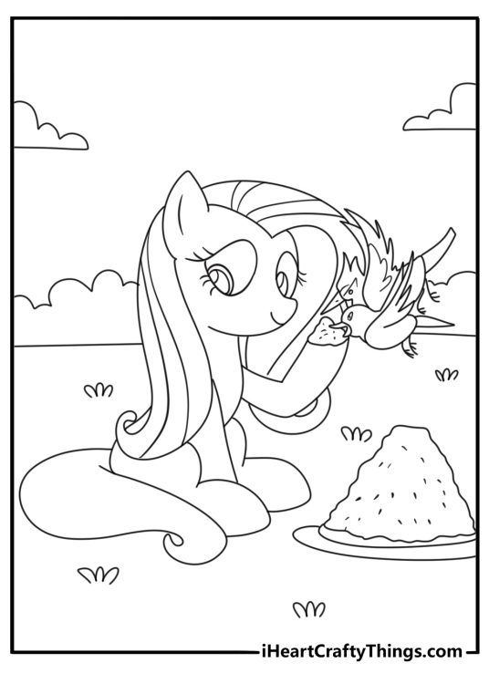 fluttershy my little pony coloring page with a gentle pegasus feeding birds near flowers