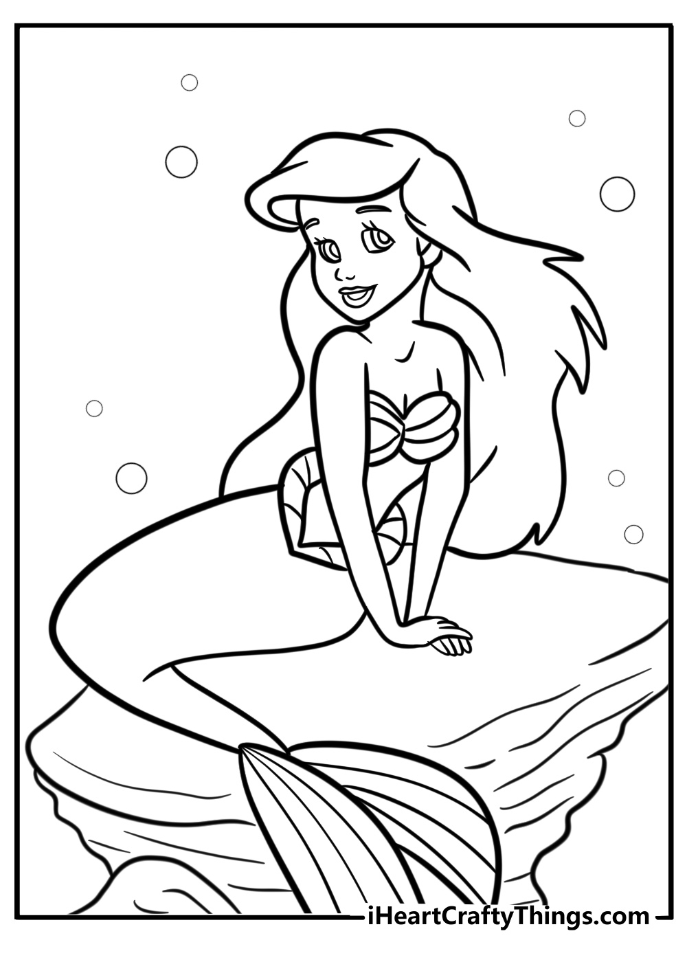 Ariel sitting on a rock free coloring page