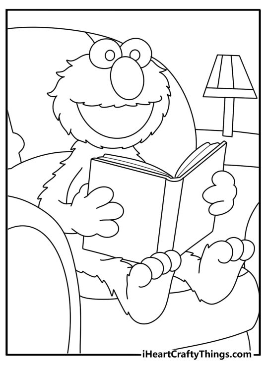 Elmo reads a bedtime story beside a small lamp in this simple printable