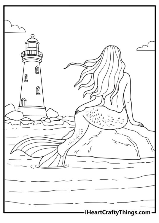 Fantasy coloring page for adults with mermaid sitting on rocks near lighthouse