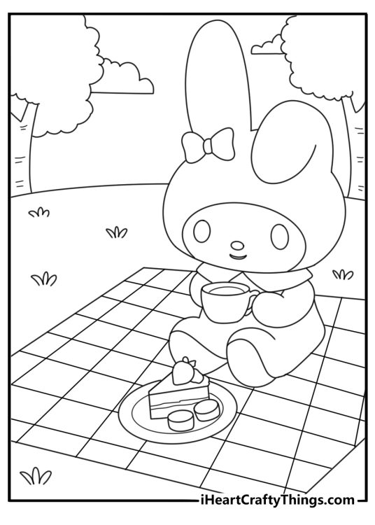 My Melody coloring sheet sitting on a picnic blanket with snacks