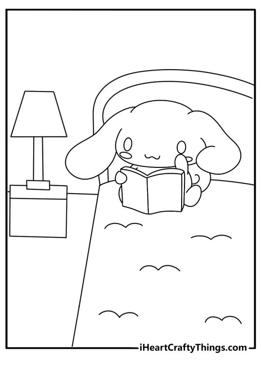 cinnamoroll opens a storybook beside a glowing bedside lamp