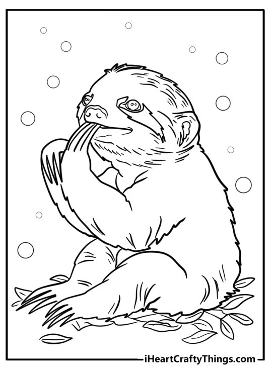Printable coloring picture featuring sloth sitting on a pile of leaves with bubbles in the background