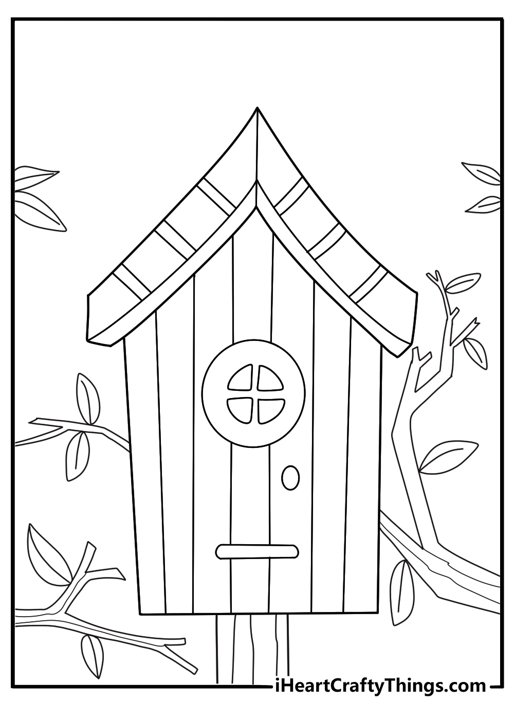 birdhouse surrounded by leaves