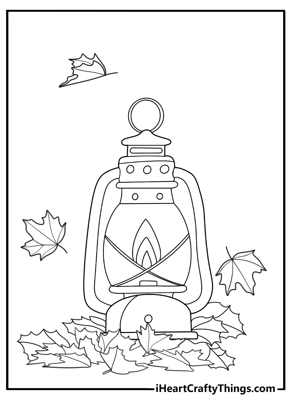 lantern surrounded by fall leaves