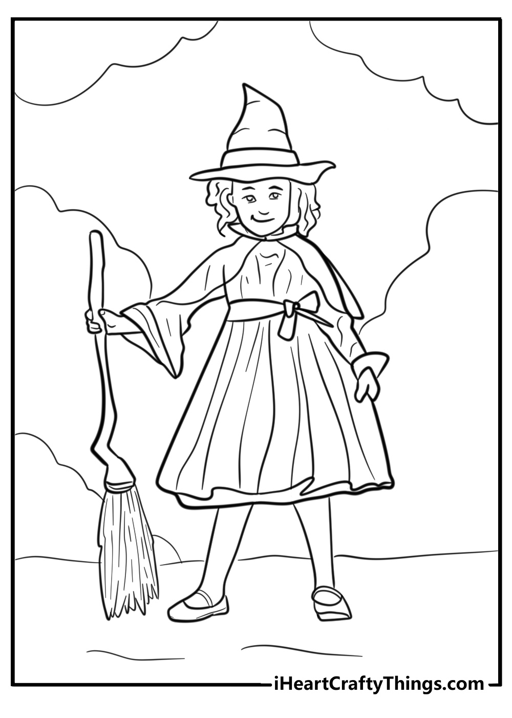 Realistic little girl wearing a festive halloween witch costume