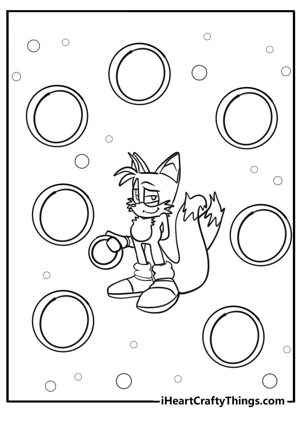 Smiling tails surrounded by sparkling gold rings coloring page