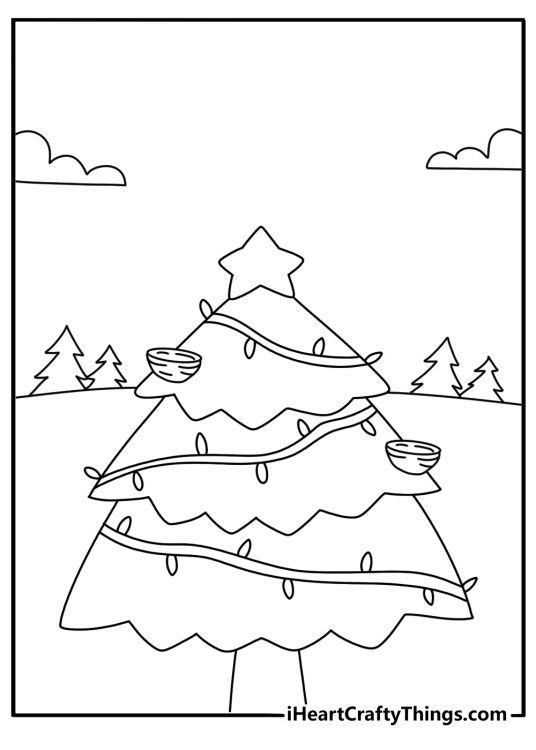 A bird nest rests between the branches of an outdoor Christmas tree