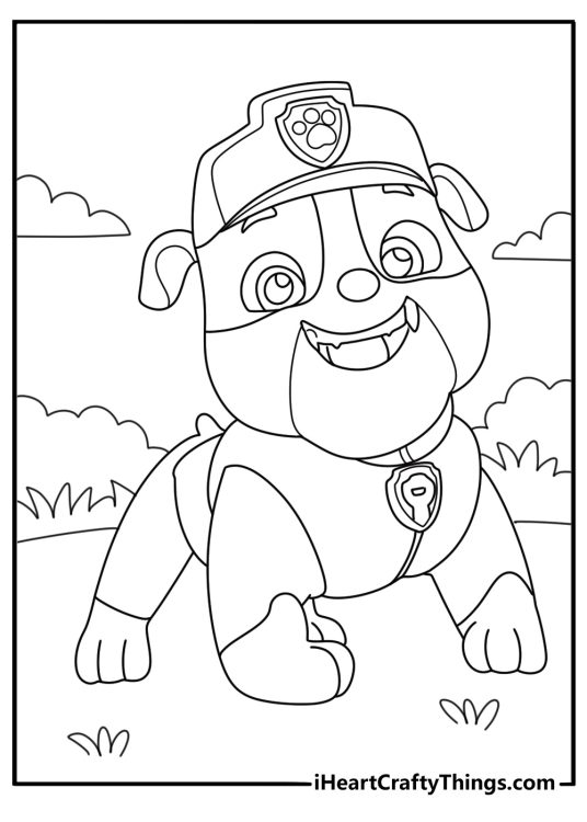 Paw Patrol coloring sheet featuring Rubble with his full equipment standing in front of some bushes