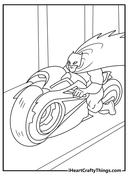 Free Batman printable of Batman riding the Batcycle through Gotham streets