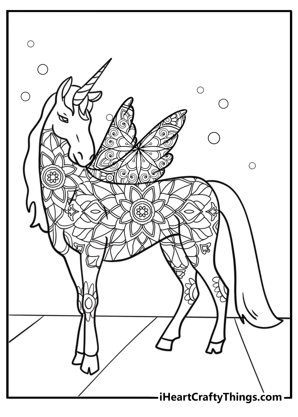Printable unicorn coloring page with mandala-style wings