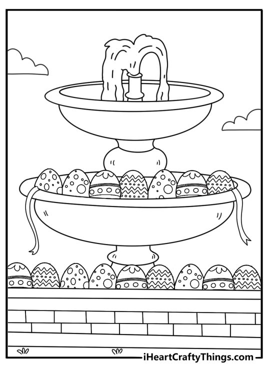 Easter coloring page showing village square fountain decorated with eggs and ribbons