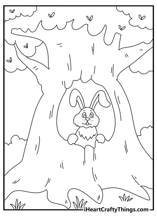 Easter coloring page with rabbit peeking from hollow tree trunk with eggs inside