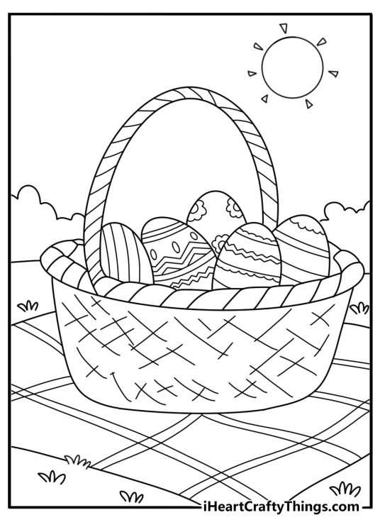 Easy Easter coloring page with spring picnic blanket and basket of dyed eggs