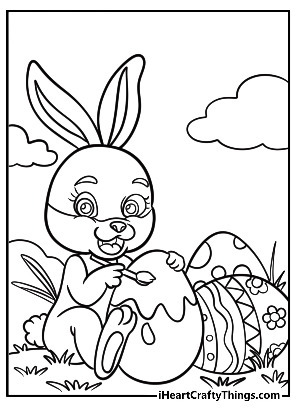 Cartoon bunny painting easter eggs coloring sheet