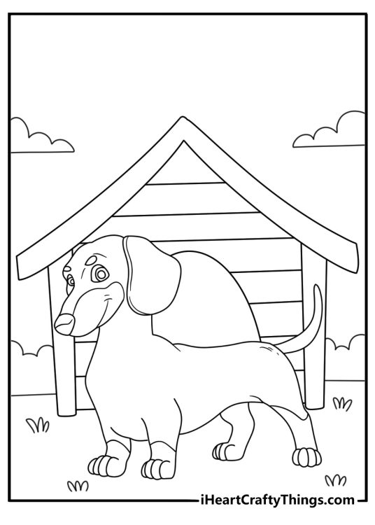 A smooth haired dog waits near a wooden doghouse in this coloring sheet