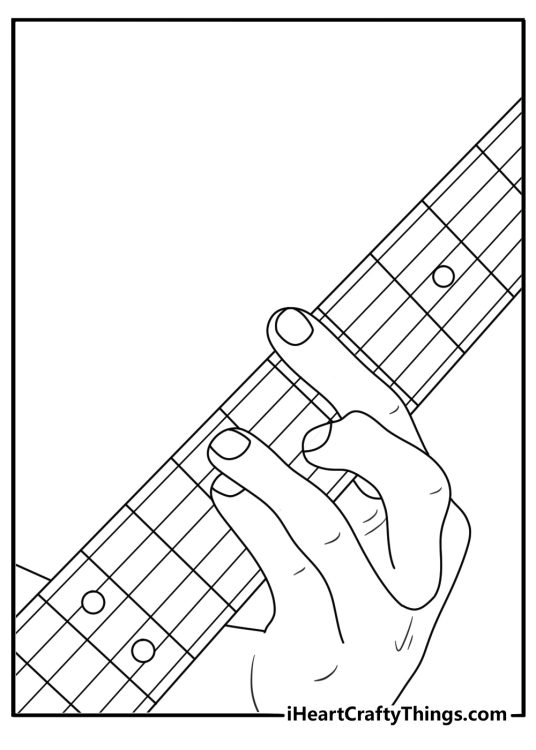 Free guitar printable showing hands playing a barre chord