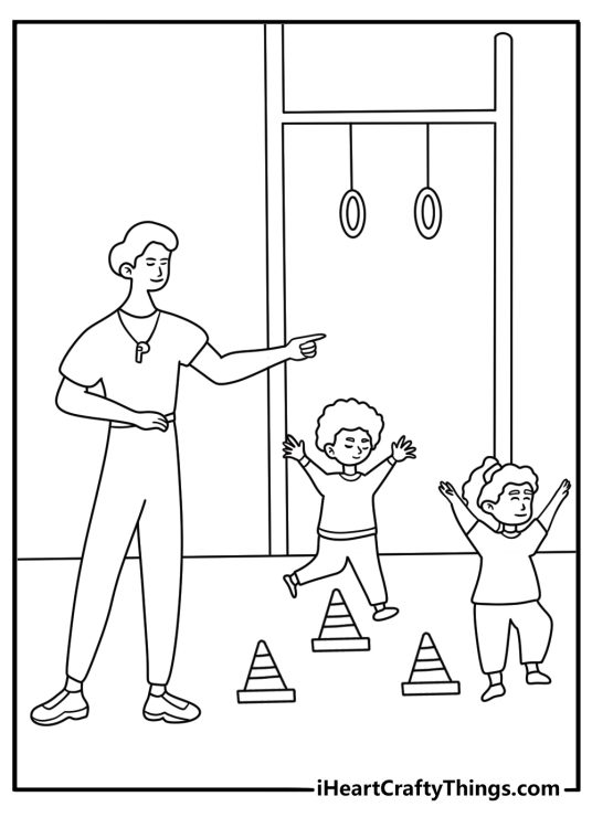 A physical education teacher sets out cones in the school gym
