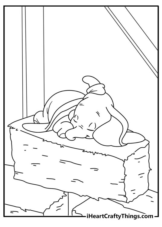 Free Dumbo coloring pages printable with Dumbo sleeping in a hay pile
