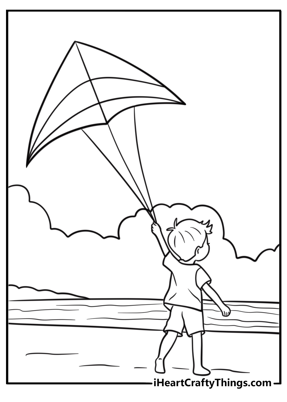 Kite soaring over a beach fun coloring sheet for kids