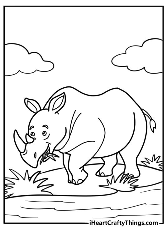 Rhino eating leaves from a bush coloring page