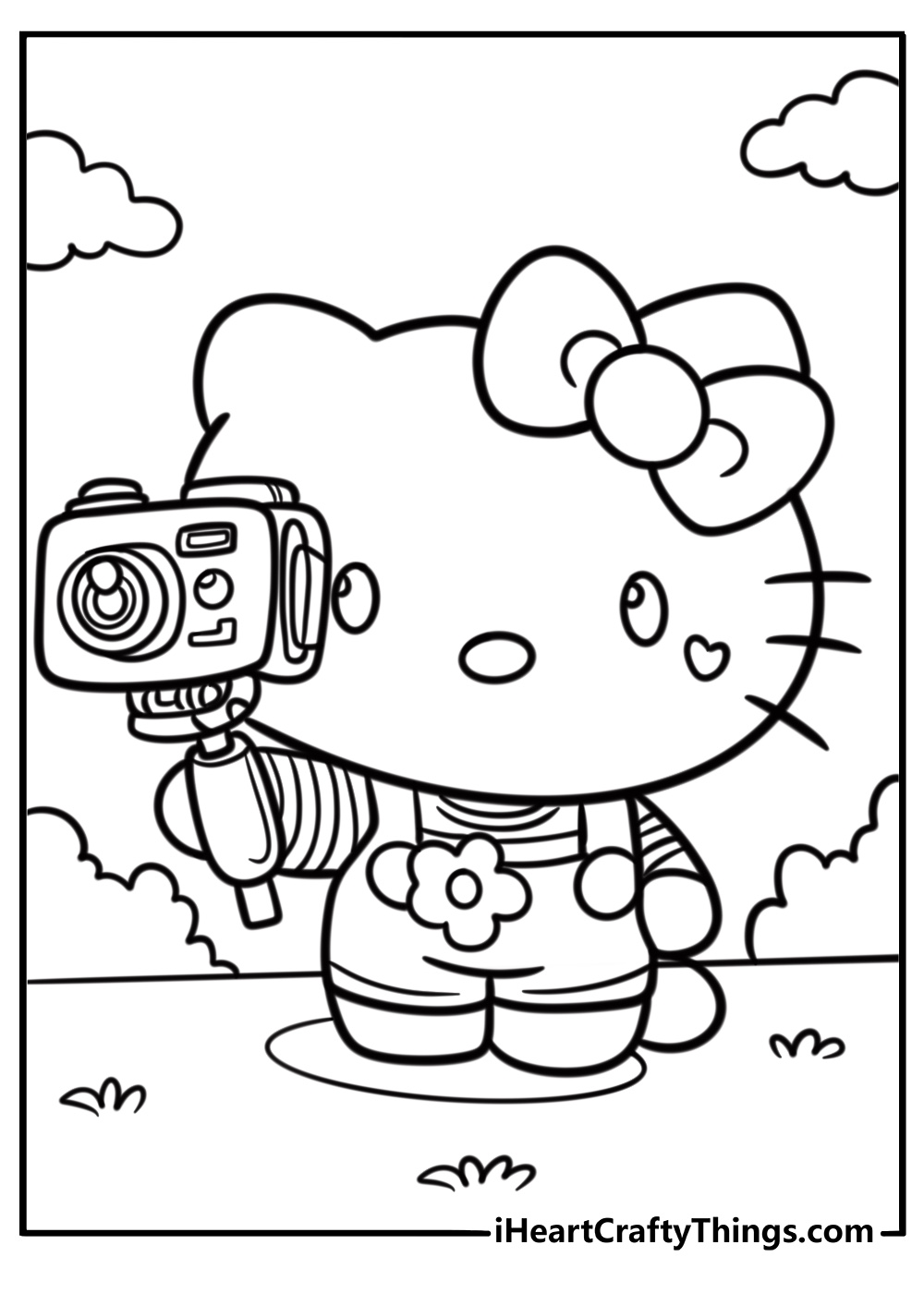 Hello Kitty with camera printable coloring sheet