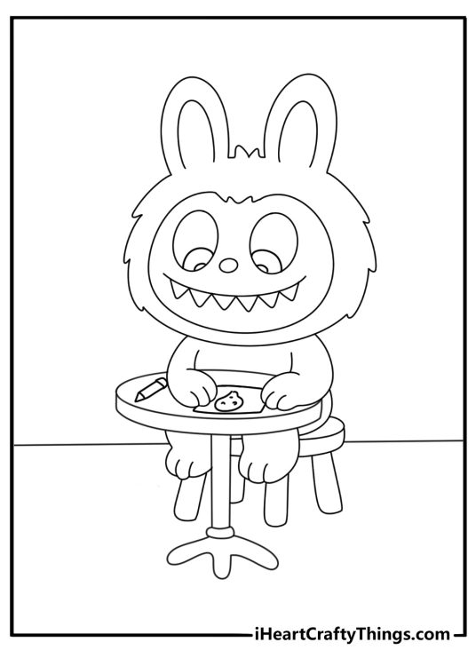 Labubu sitting at a desk drawing doodles printable coloring page