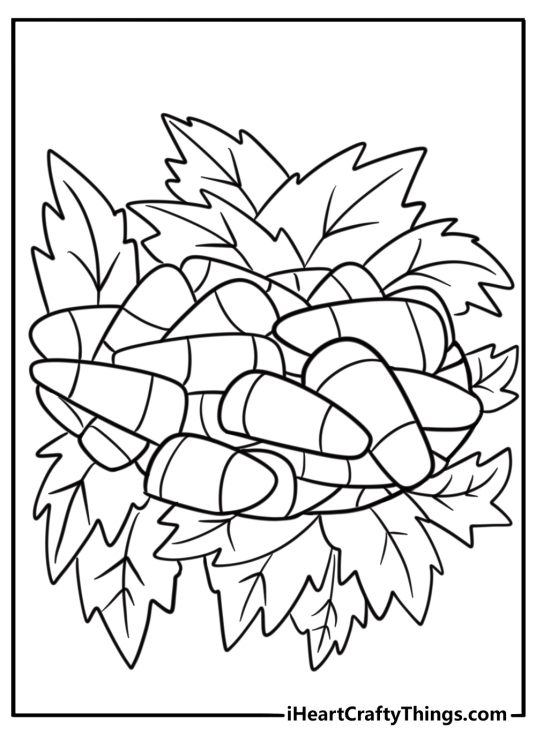 Candy corn surrounded by autumn leaves coloring sheet for kids